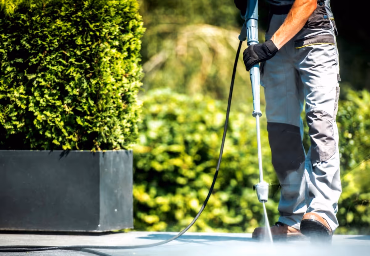 Asphalt roller paving commercial driveway for resurfacing and lot improvement project